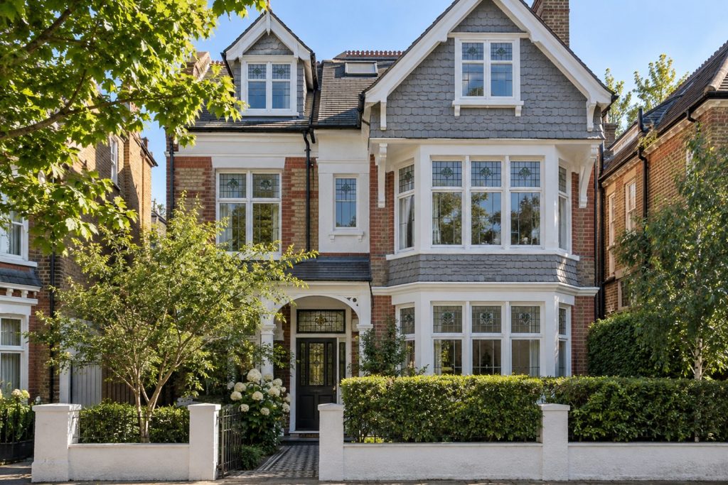 Front exterior, eye-level view of the building and its entrance - 2-bedroom flat in Clapham