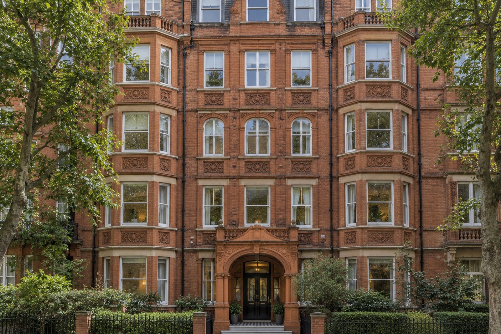 Front exterior, eye-level view of the building and its entrance - 2-bedroom flat in Wimbledon