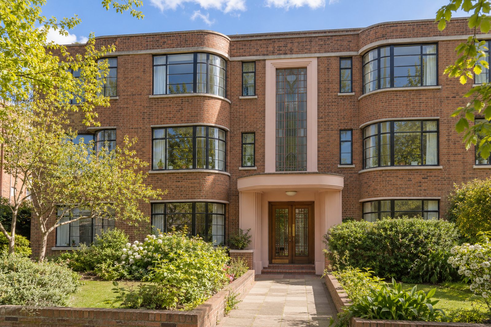Front exterior, eye-level view of the building and its entrance - 3-bedroom flat in Balham