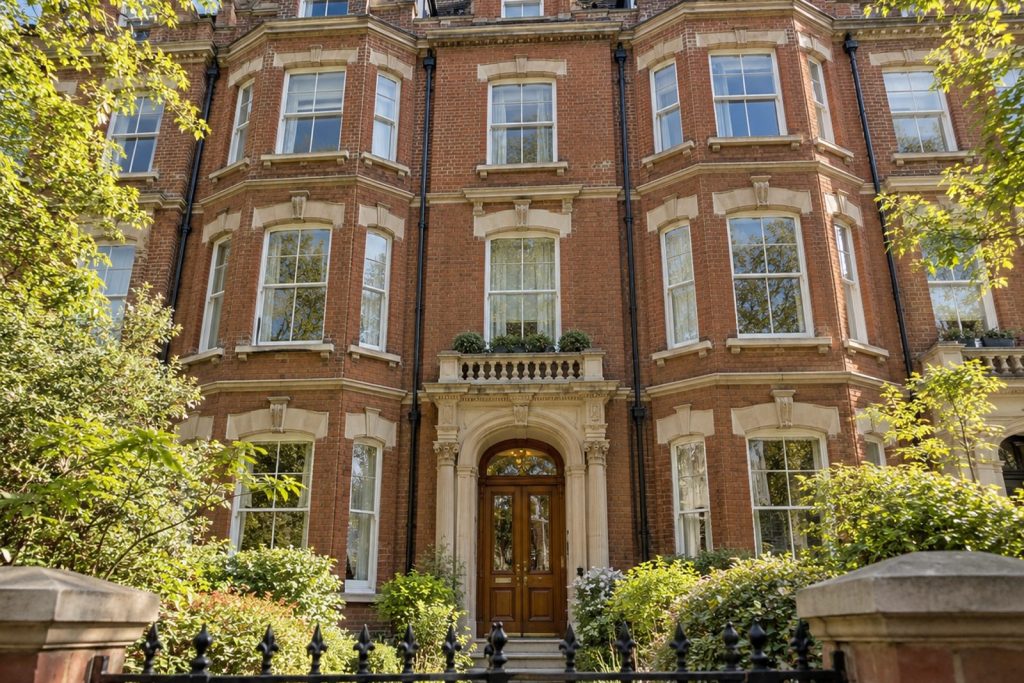 Front exterior, eye-level view of the building and its entrance - 3-bedroom flat in Battersea