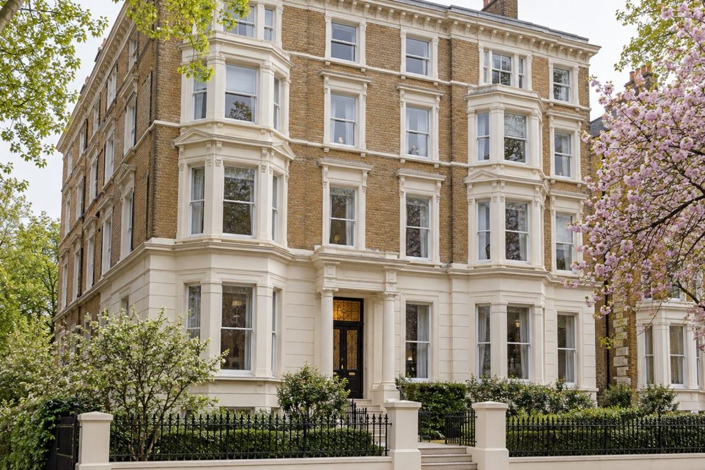Front exterior, eye-level view of the building and its entrance - 1-bedroom flat in Clapham