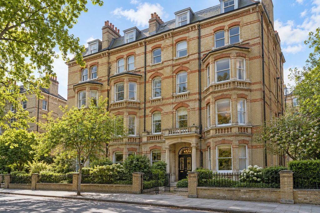 Front exterior, eye-level view of the building and its entrance - 1-bedroom flat in Clapham