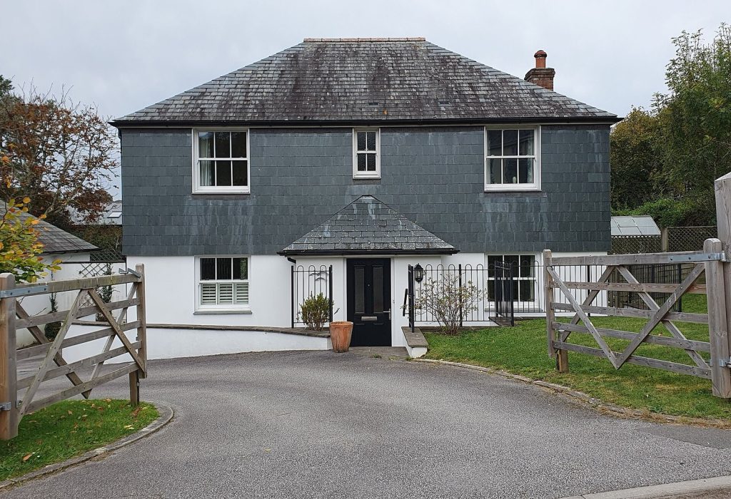 Modern slate-hung detached house with slate porch, Grampound, Cornwall