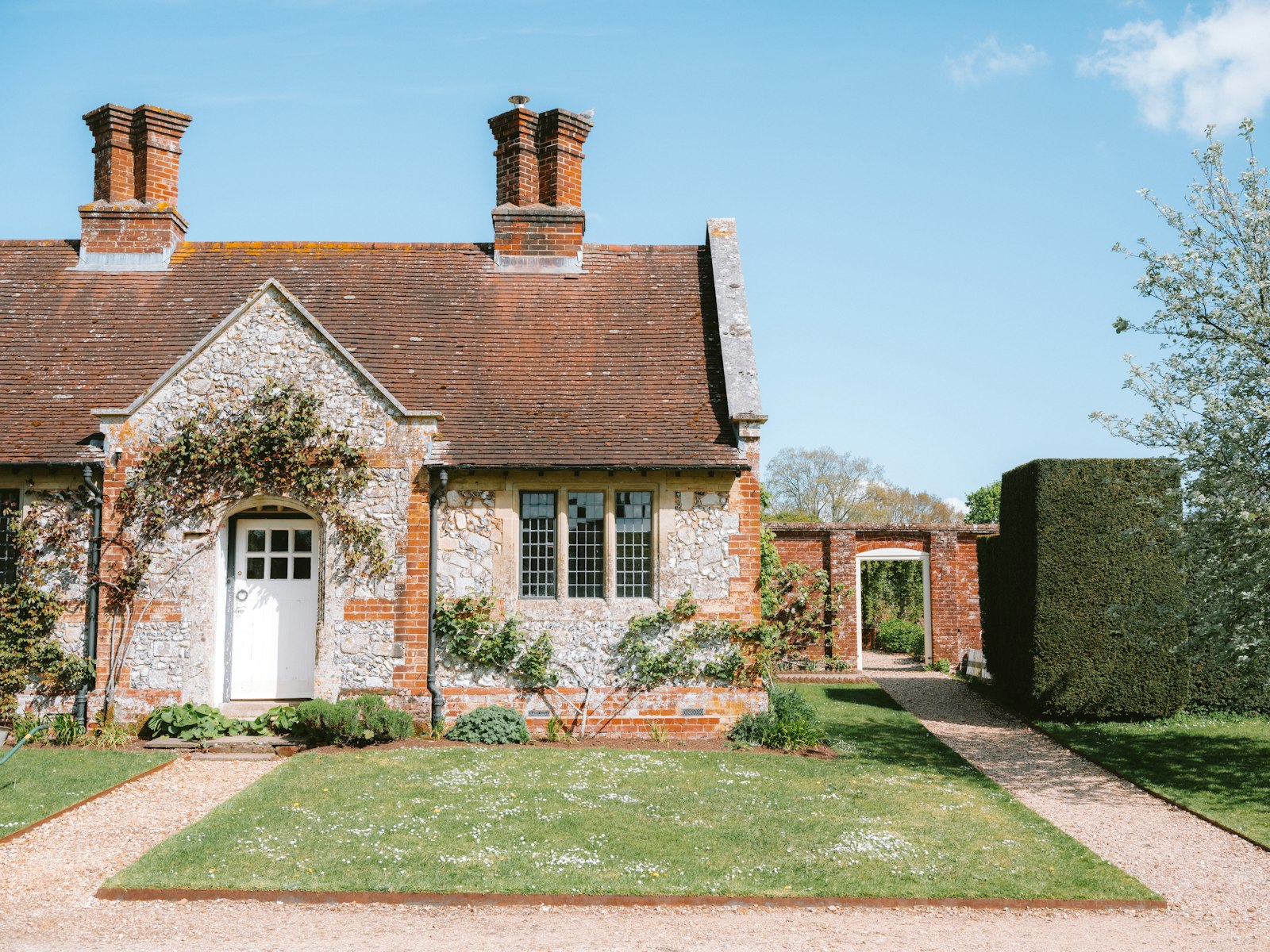 A cottage with a garden