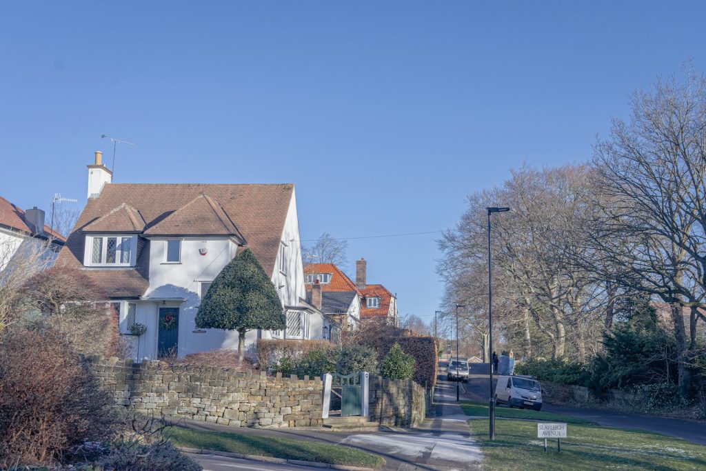 Edwardian detached house with a car on the drive