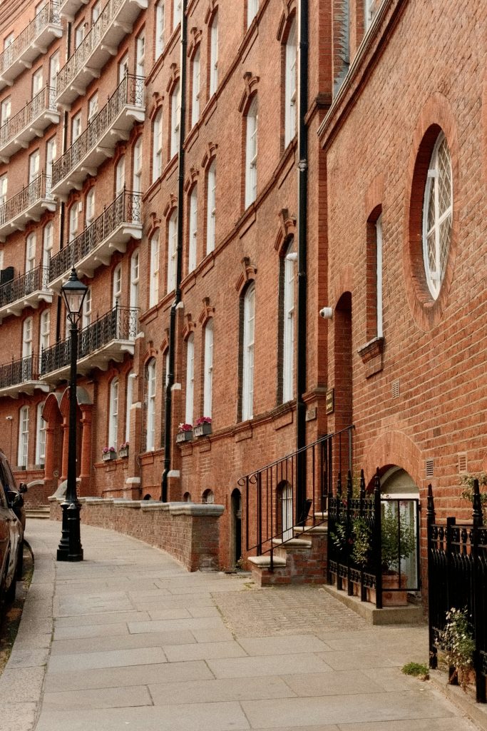 Edwardian red brick mansion block with balconies