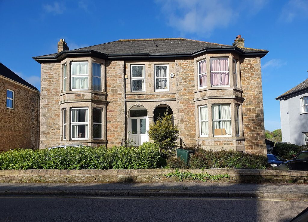 Granite Victorian semi-detached pair with double bay windows, Redruth, Cornwall